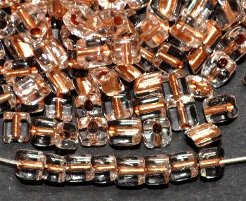 Glasperlen / cut pipes von Preciosa Ornella Tschechien, kristall rauchig getönt mit Cupfereinzug, 
 Rechteckform abgeschrägten