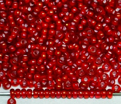 Rocailles von Preciosa Ornela Tschechien, rot transp. mit Farbeinzug weiß und light AB finish