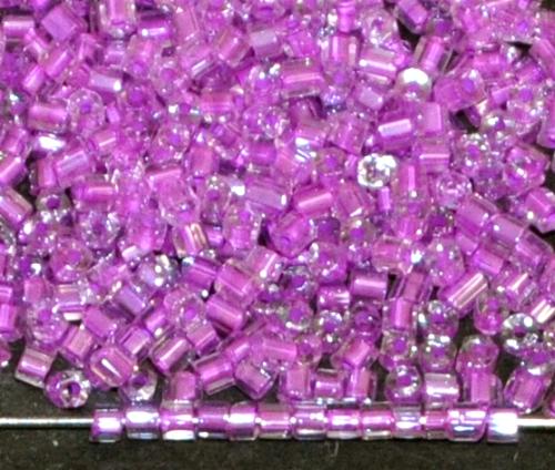 2 cut beads von Ornella Preciosa Tschechien, kristall mit Farbeinzug violett und lüster