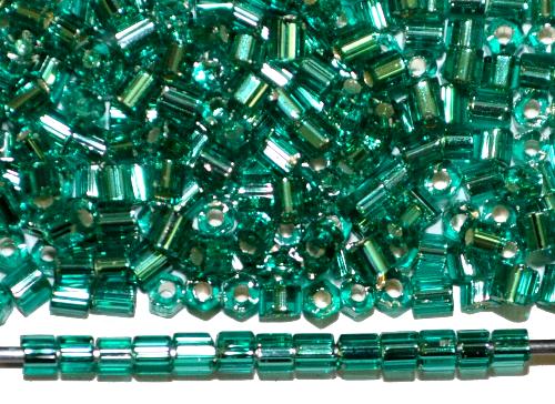 Glasperlen / 2-cut-beads 
 von Preciosa Tschechien hergestellt, 
 petrol transp. mit Silbereinzug