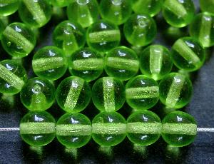 Glasperlen rund
 grün transparent,
 hergestellt in Gablonz / Tschechien