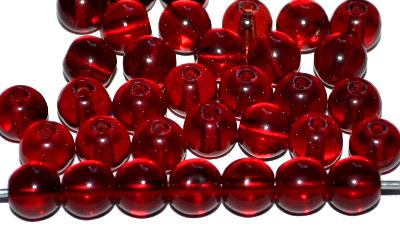 Glasperlen rund
 granatrot transp.,
 hergestellt in Gablonz / Tschechien