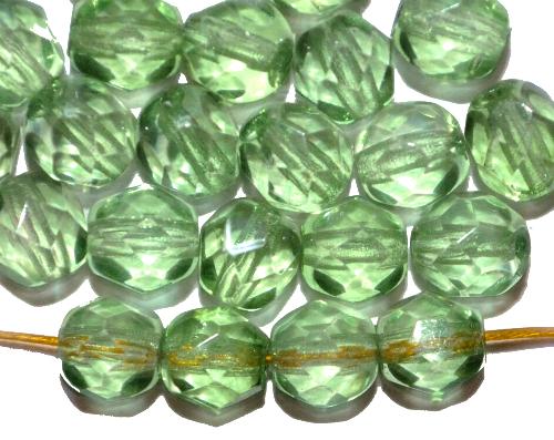 facettierte Glasperlen 
 grün transp.,
 hergestellt in Gablonz / Tschechien