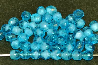 facettierte Glasperlen
 blau weiß transparent,
 hergestellt in Gablonz / Tschechien