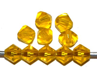 mc-Schliff Glasperlen bicon
 gelb transp.,
 hergestellt in Gablonz / Tschechien
 