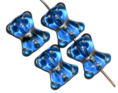 Glasperlen Bärchen, Vorderseite geprägt, blau transp. mit Silberauflage, hergestellt in Gablonz / Tschechien