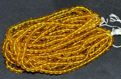 Glasperlen rund, gelb transp., in den 1920/30 Jahren in Gablonz/Böhmen hergestellt