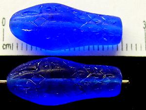 Glasperle Schlangenkopf,
 blau transp.,
 Vorder-und Rückseite geprägt, 
 hergestellt in Gablonz / Tschechie
 