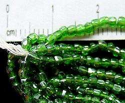 3-Cutbeads ca.1940 hergestellt
 grün transp. mit lüster